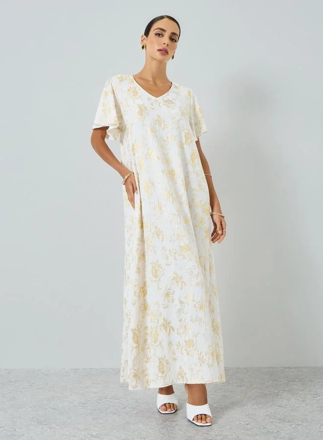 تايك تو جلابية بطبعة زهور وأكمام قصيرة